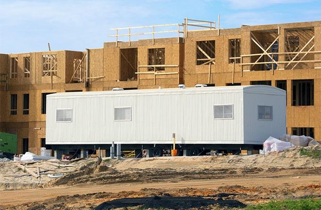 crane lifting modular building for construction office rentals in Daly City CA